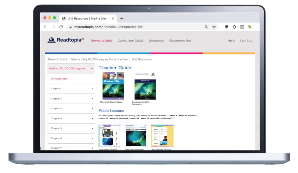 Readtopia-laptop - Building Wings Open laptop with Readtopia Thematic Units website open to Marine Life Teacher Guide page.