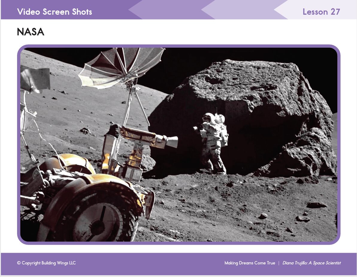 Readtopia Astronaut - Building Wings Readtopia Video screenshot of an astronaut on a rock in space, next to a satellite.